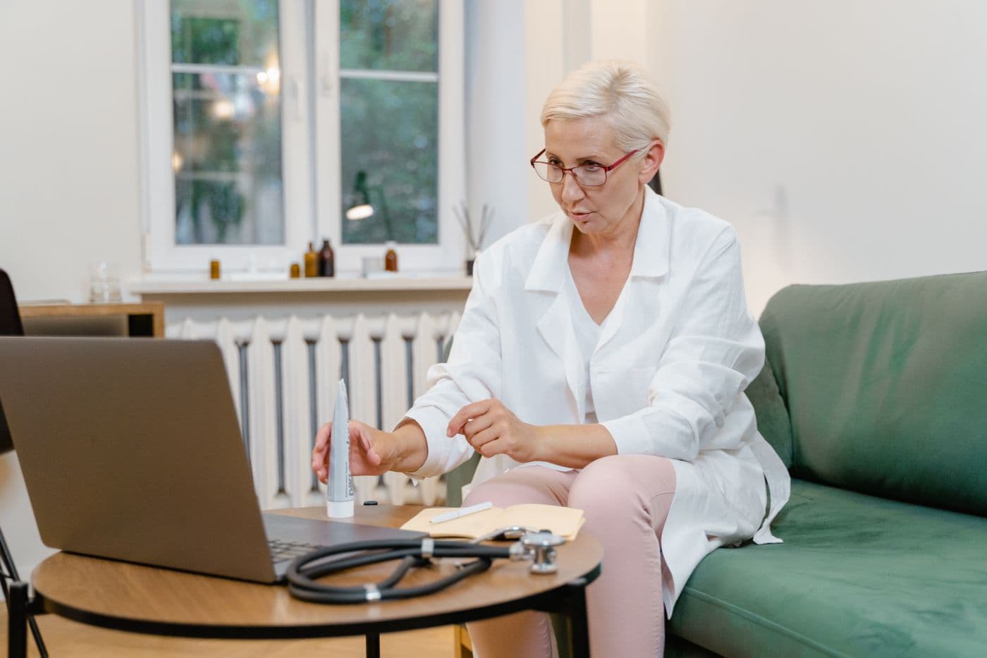 A doctor explaining care during a video consultation